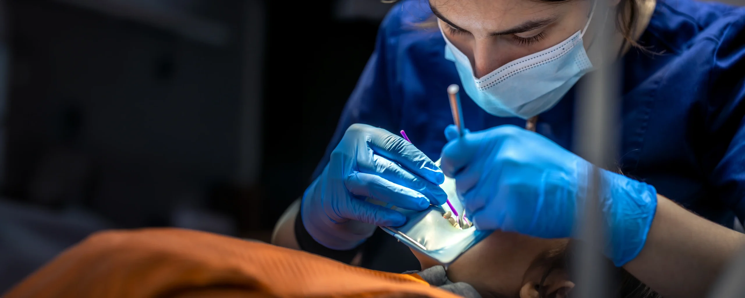 dentist-work-young-woman-dentist-treating-kid-tooth-dentistry-concept_compressed